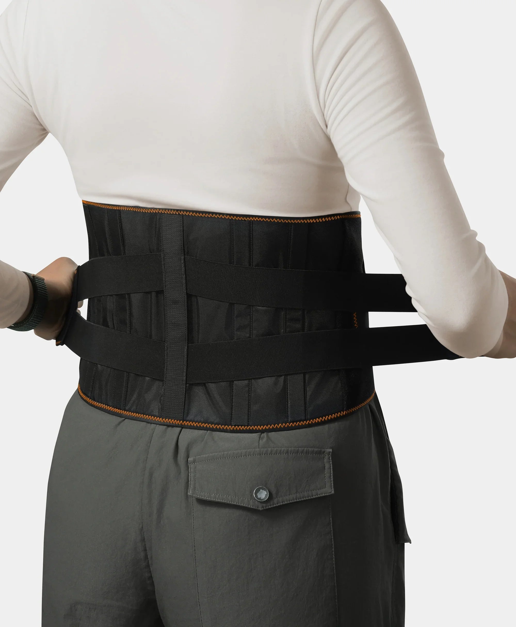Model adjusting the elastic strap of product
